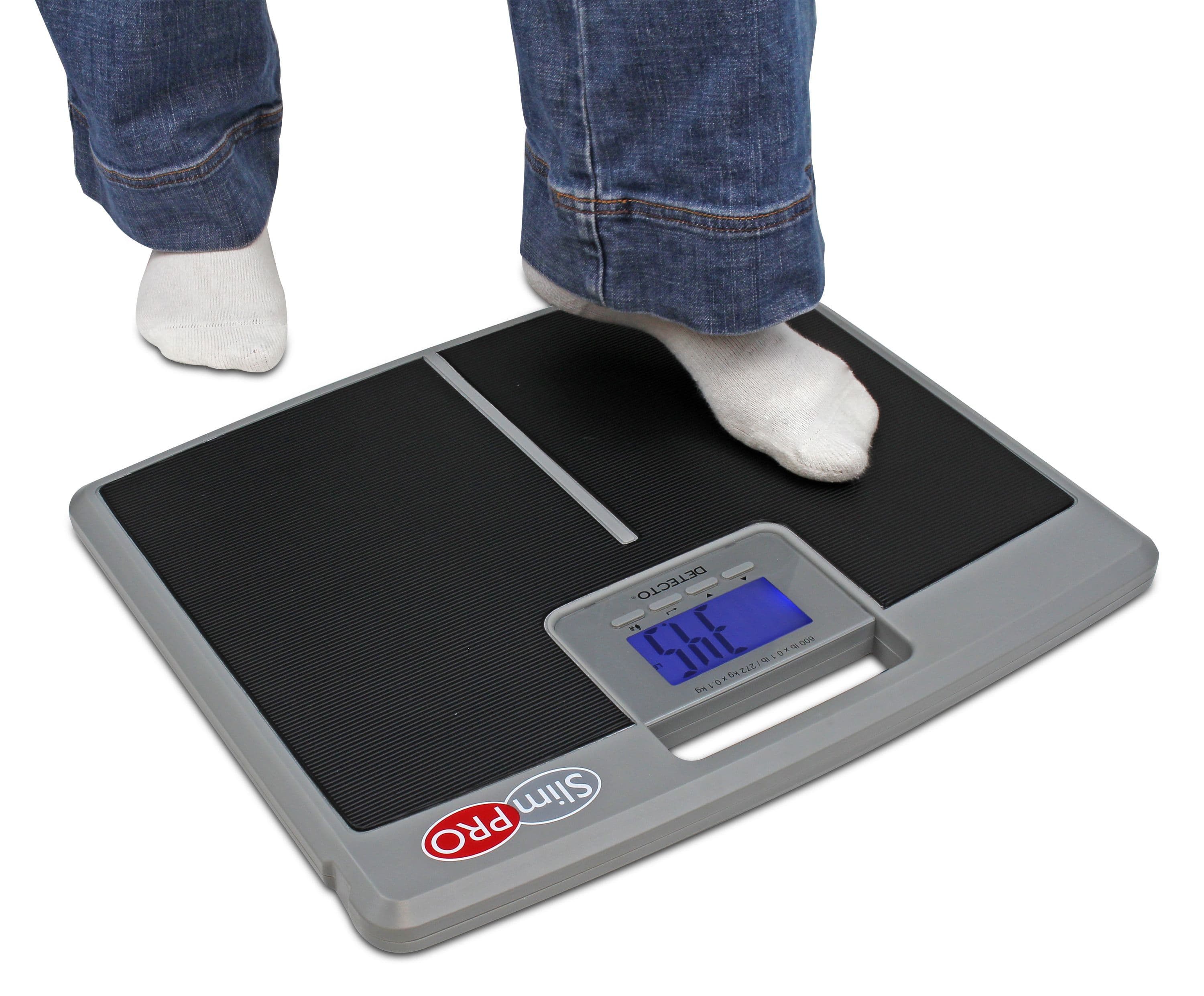 SlimPro-Stepping_on_Scale.jpg
