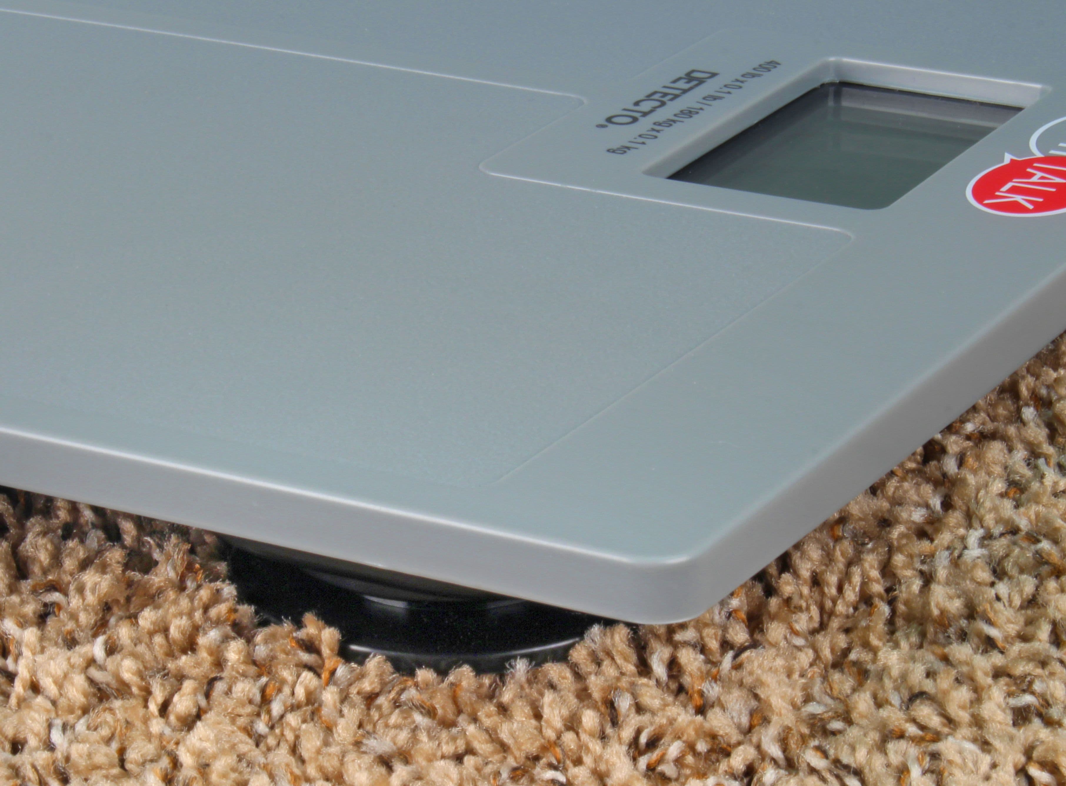 SlimTalk_FootOnCarpet.jpg